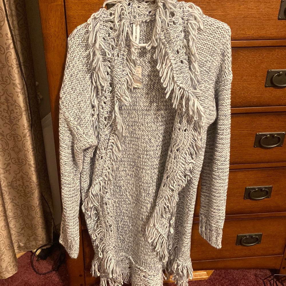 Women’s blue sweater.